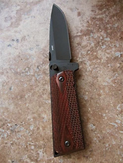 D&L Sports™ knife with 1911 pistol grip handle