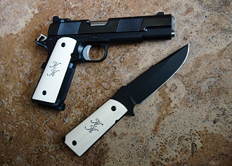 1911 and matching knife with ivory grips