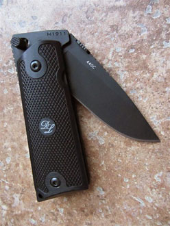 D&L Sports™ knife with 1911 pistol grip handle