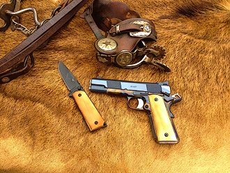 Custom 1911, knife and spurs